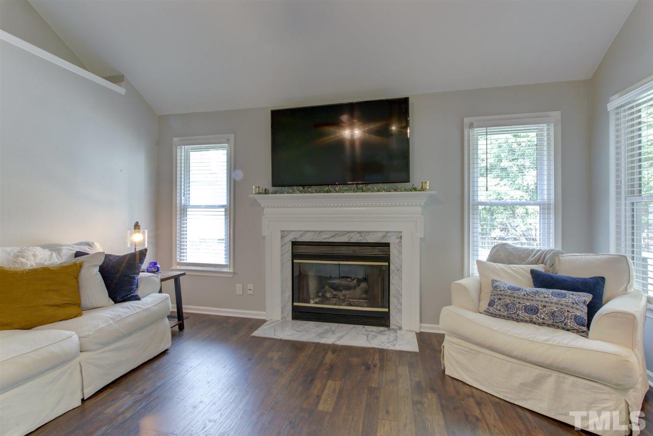 5516 Banwell Place Raleigh, NC 27613 - Photo 12 of 30 Lots of natural light and tall ceiling in family room's inviting space