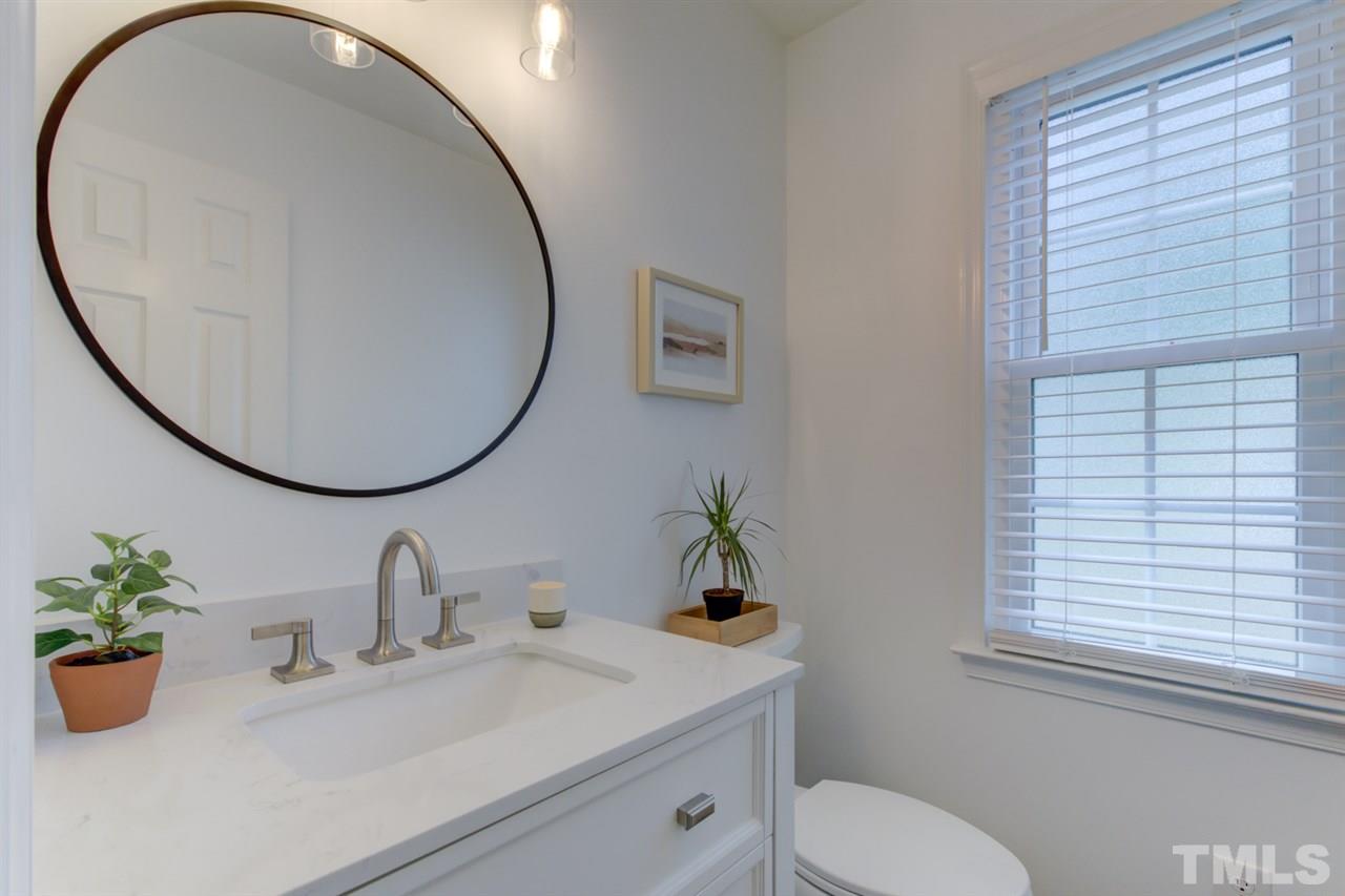 5516 Banwell Place Raleigh, NC 27613 - Photo 16 of 30 First floor half bathroom recently updated
