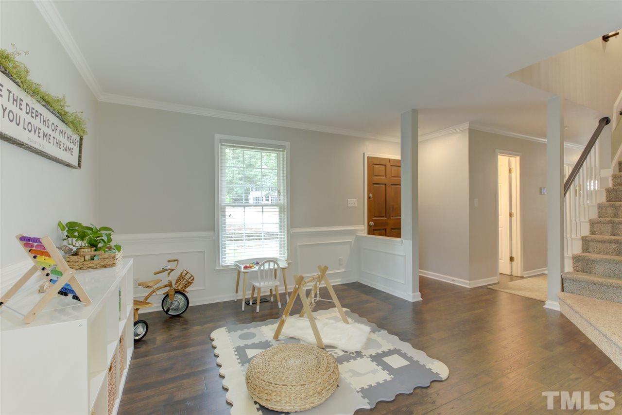 5516 Banwell Place Raleigh, NC 27613 - Photo 3 of 30 Inviting entry welcomes you to home filled with light! New Engineered Hand Scraped Hardwoods Throughout First Floor. Newer interior paint (2018)