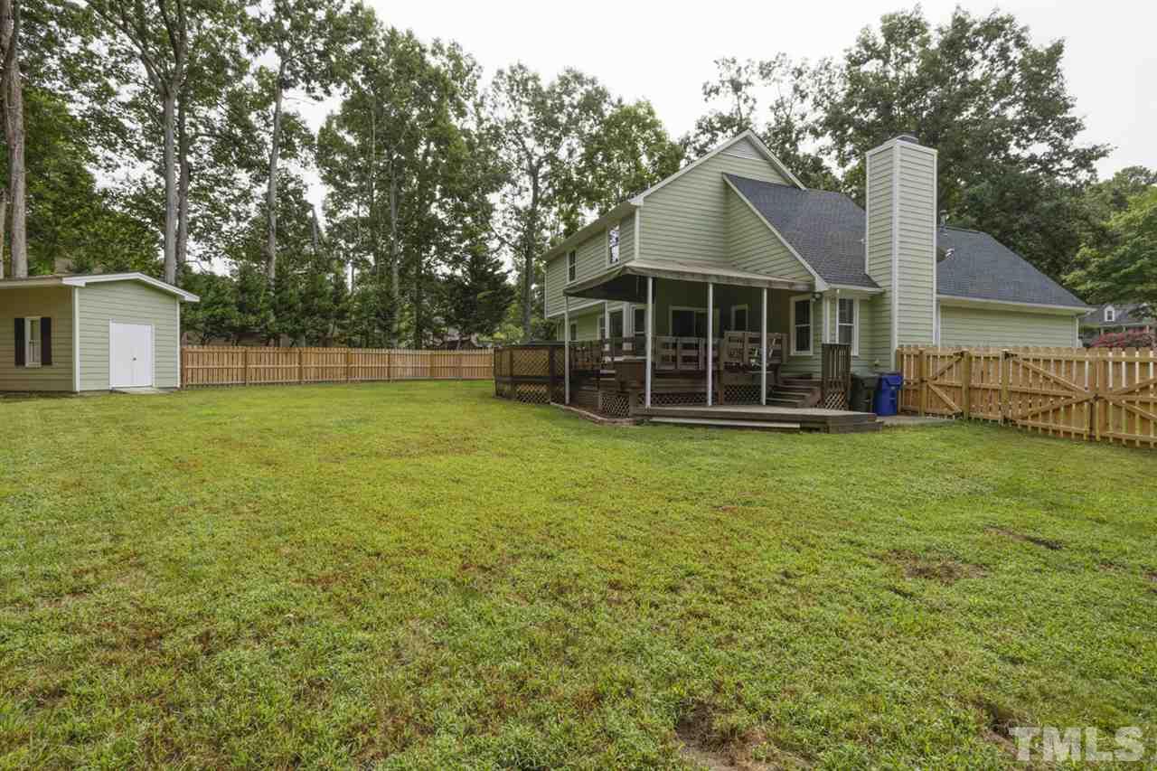5516 Banwell Place Raleigh, NC 27613 - Photo 27 of 30 Rear view of home. Separate storage shed for additional storage needs