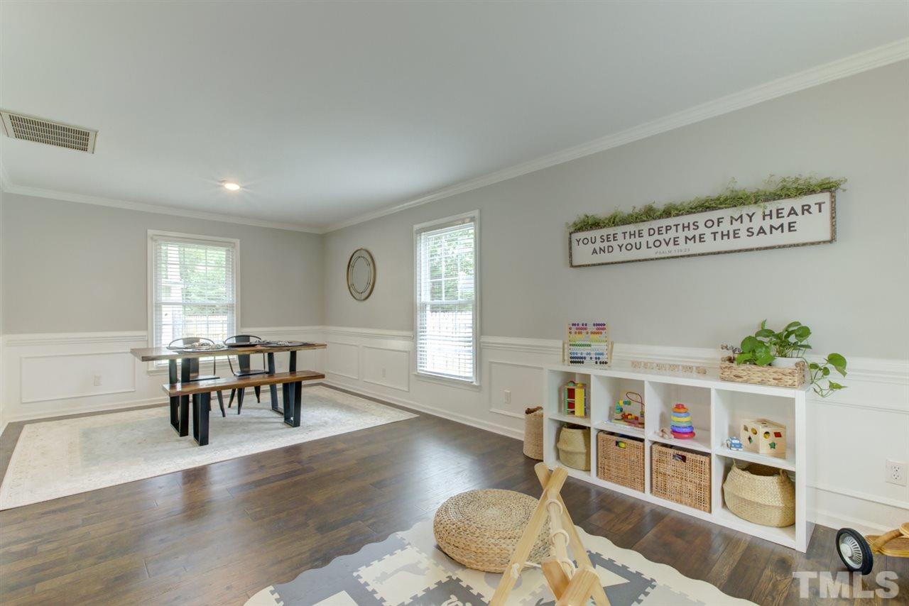 5516 Banwell Place Raleigh, NC 27613 - Photo 5 of 30 View of Open Living Room and Dining Room area - bright, multi purpose area