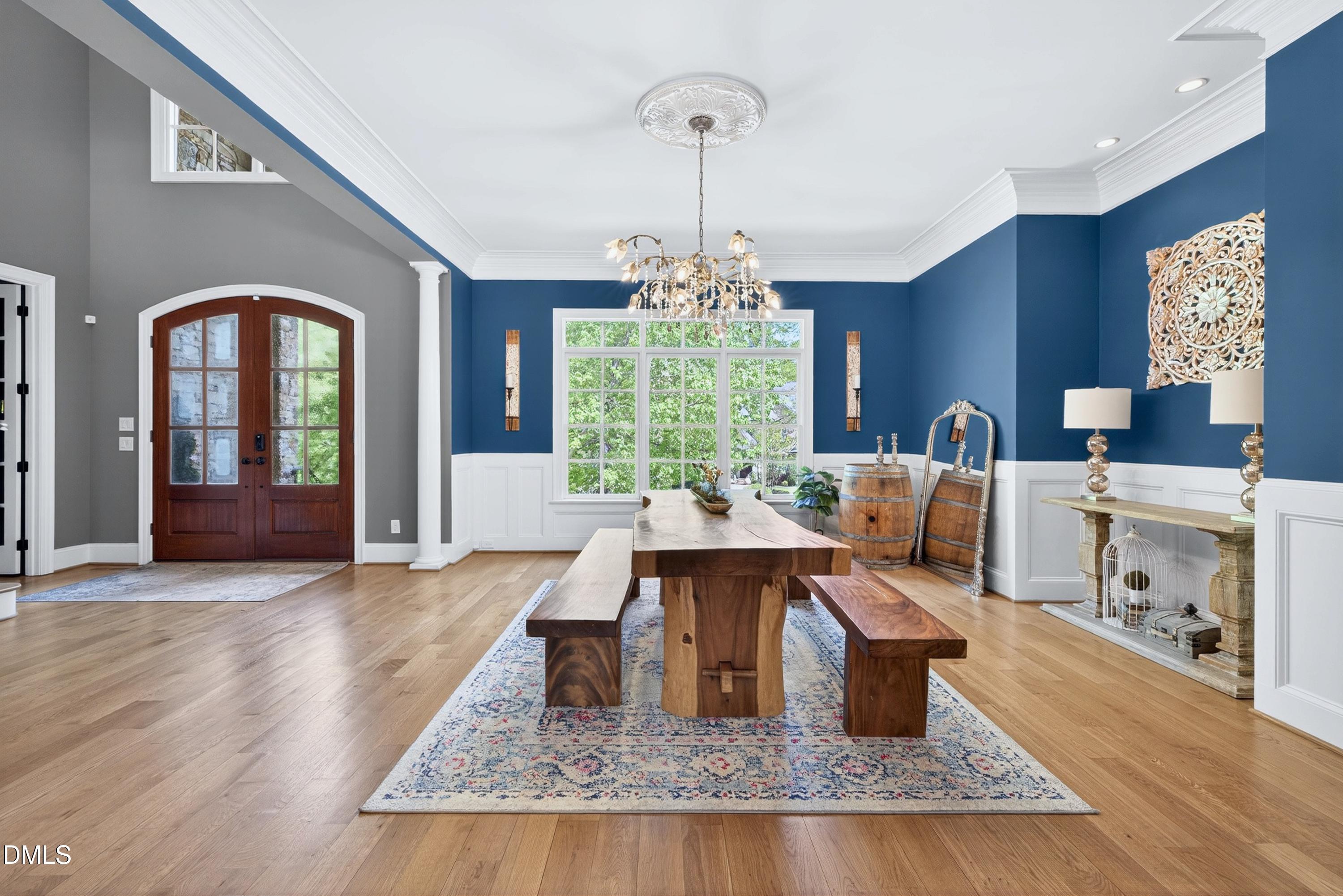 3513 Eilla Bluffs Court Raleigh, NC 27606 - Photo 7 of 86 a view of a dining room with furniture window and wooden floor