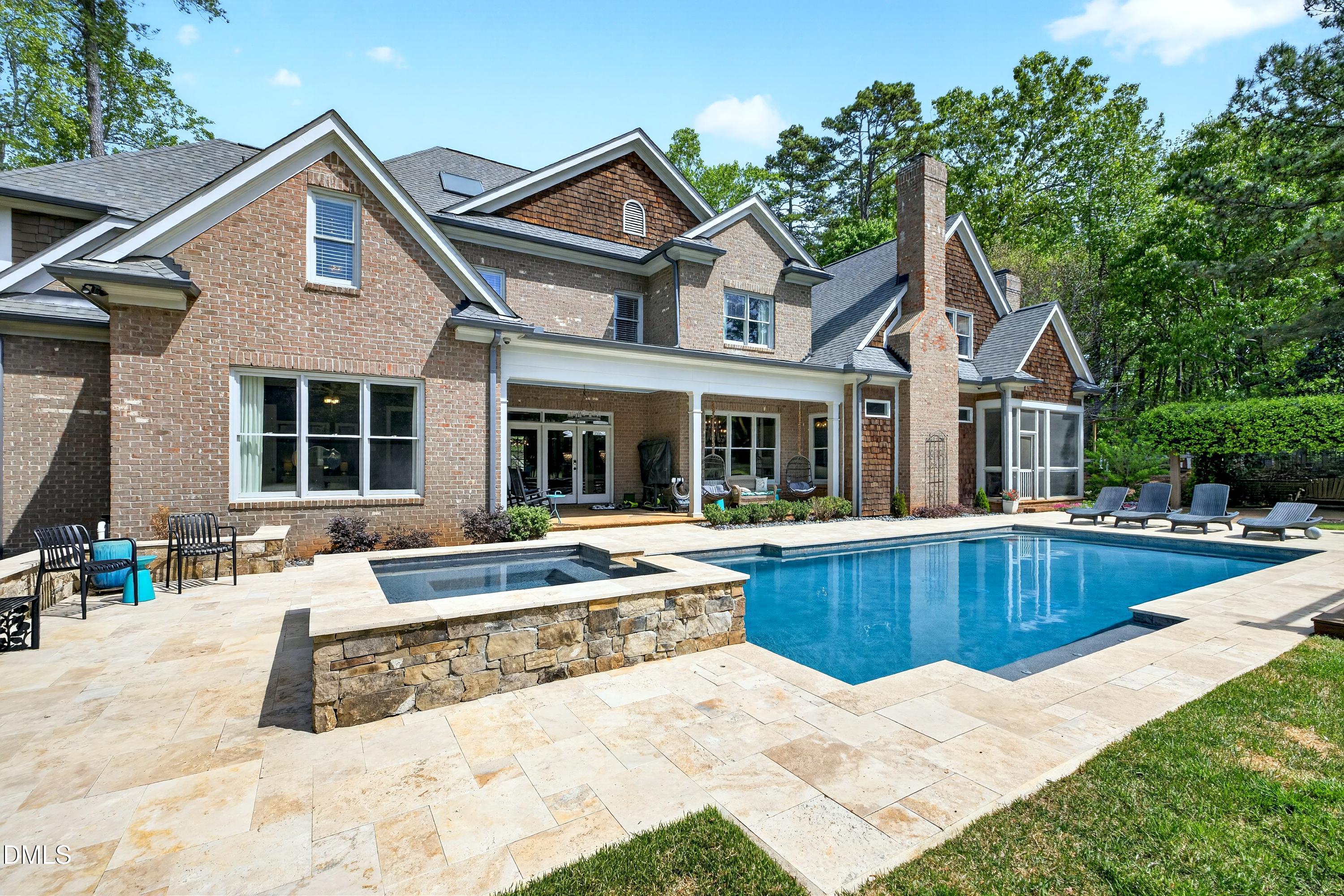 3513 Eilla Bluffs Court Raleigh, NC 27606 - Photo 76 of 86 a view of a house with swimming pool and a porch