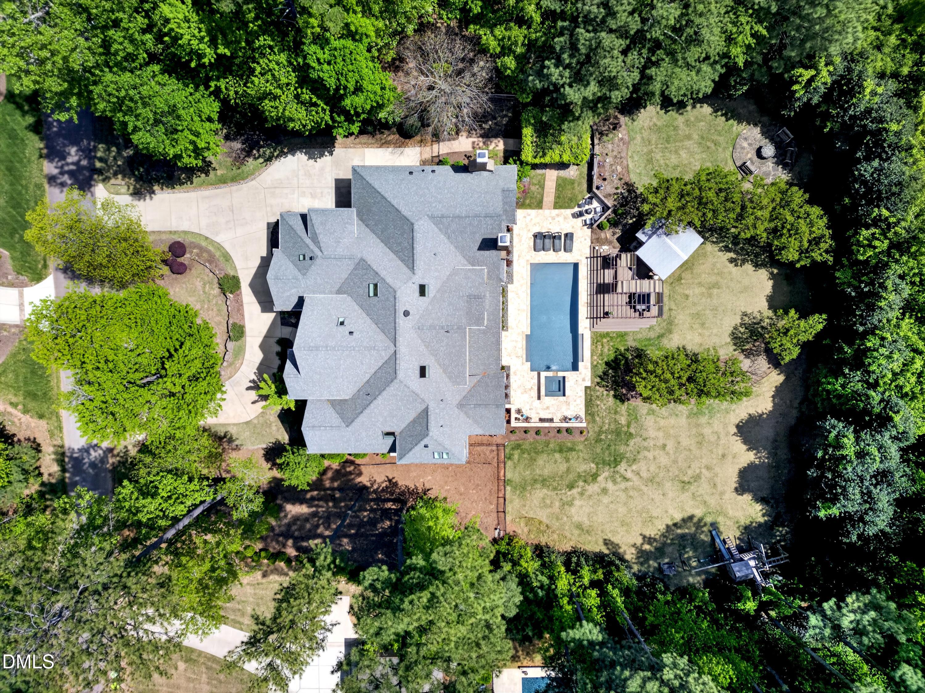 3513 Eilla Bluffs Court Raleigh, NC 27606 - Photo 85 of 86 an aerial view of residential house with outdoor space and swimming pool