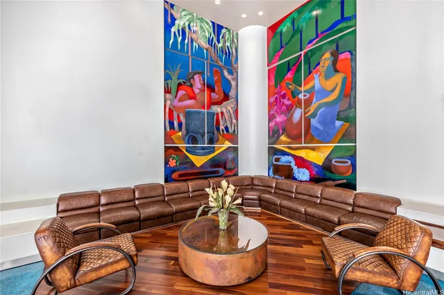 a room with furniture and painting on wall