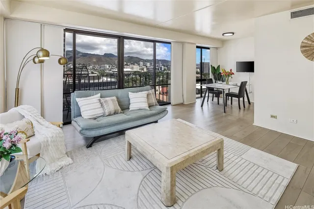 a living room with furniture and a table