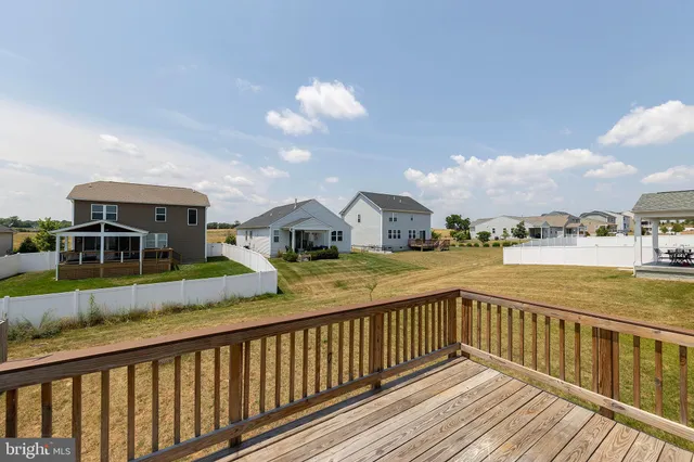 a view of a street with a ocean view