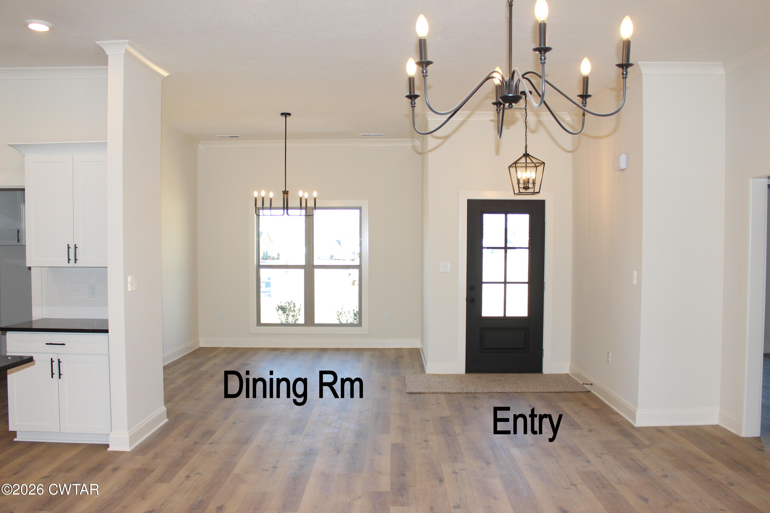 148 Calumet Cove Medina, TN 38355 - Photo 2 of 21 a front view of a room with a window and wooden floor