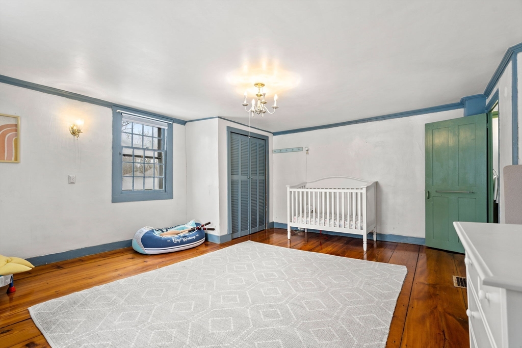 4 Thorndike Street Dunstable, MA 01827 - Photo 27 of 35 a bedroom with a bed and a window