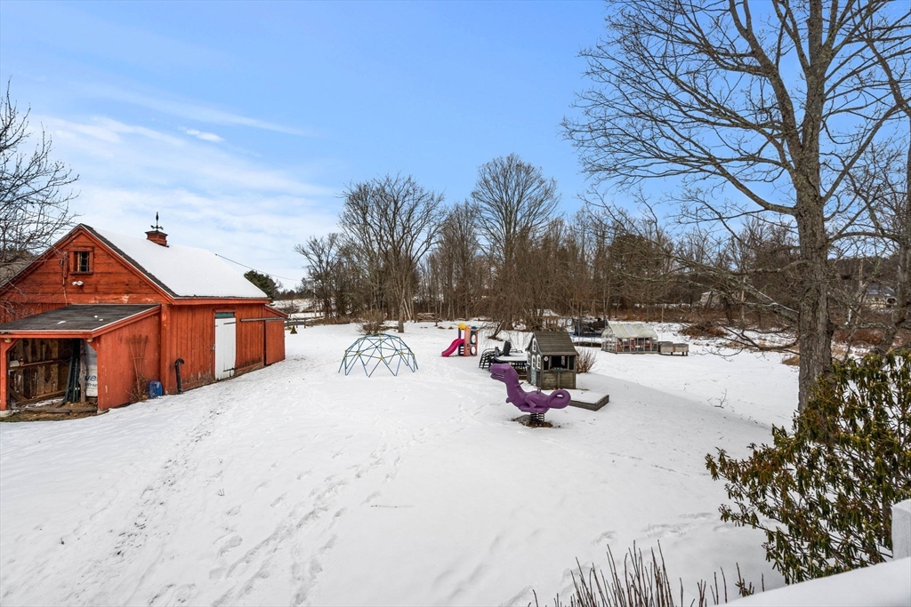 4 Thorndike Street Dunstable, MA 01827 - Photo 28 of 35 a view of outdoor space with house and trees in the background