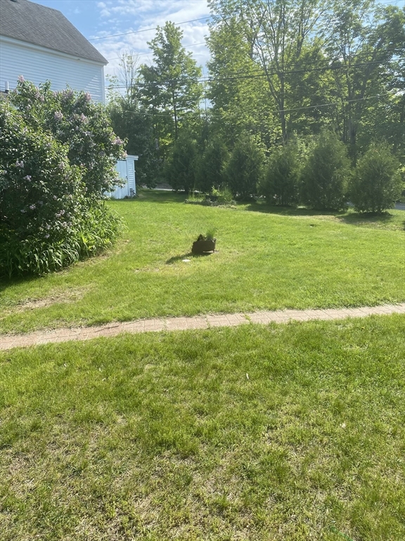 4 Thorndike Street Dunstable, MA 01827 - Photo 32 of 35 a view of a grassy field