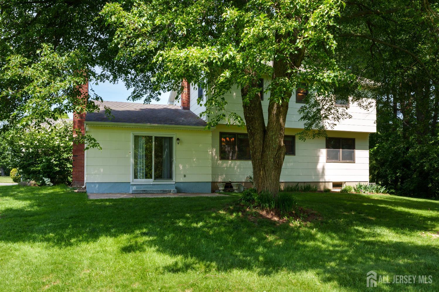 132 Fairfield Road Princeton, NJ 08540 - Photo 20 of 22 a front view of a house with a yard and large trees