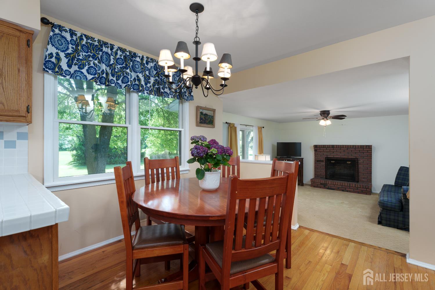 132 Fairfield Road Princeton, NJ 08540 - Photo 9 of 22 a view of a dining room with furniture wooden floor and chandelier