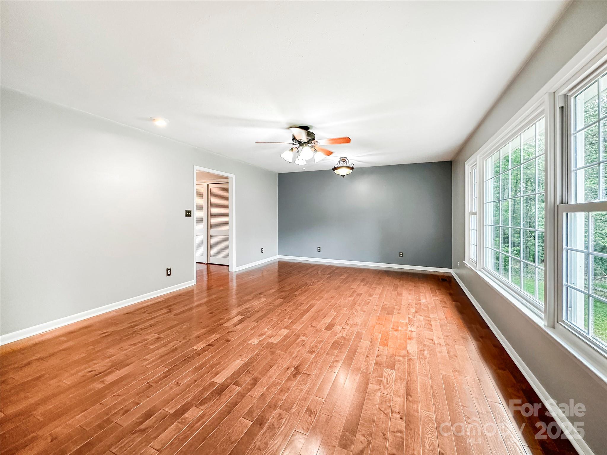 200 Woodside Drive Morganton, NC 28655 - Photo 11 of 48 a view of a room with wooden floor and a window