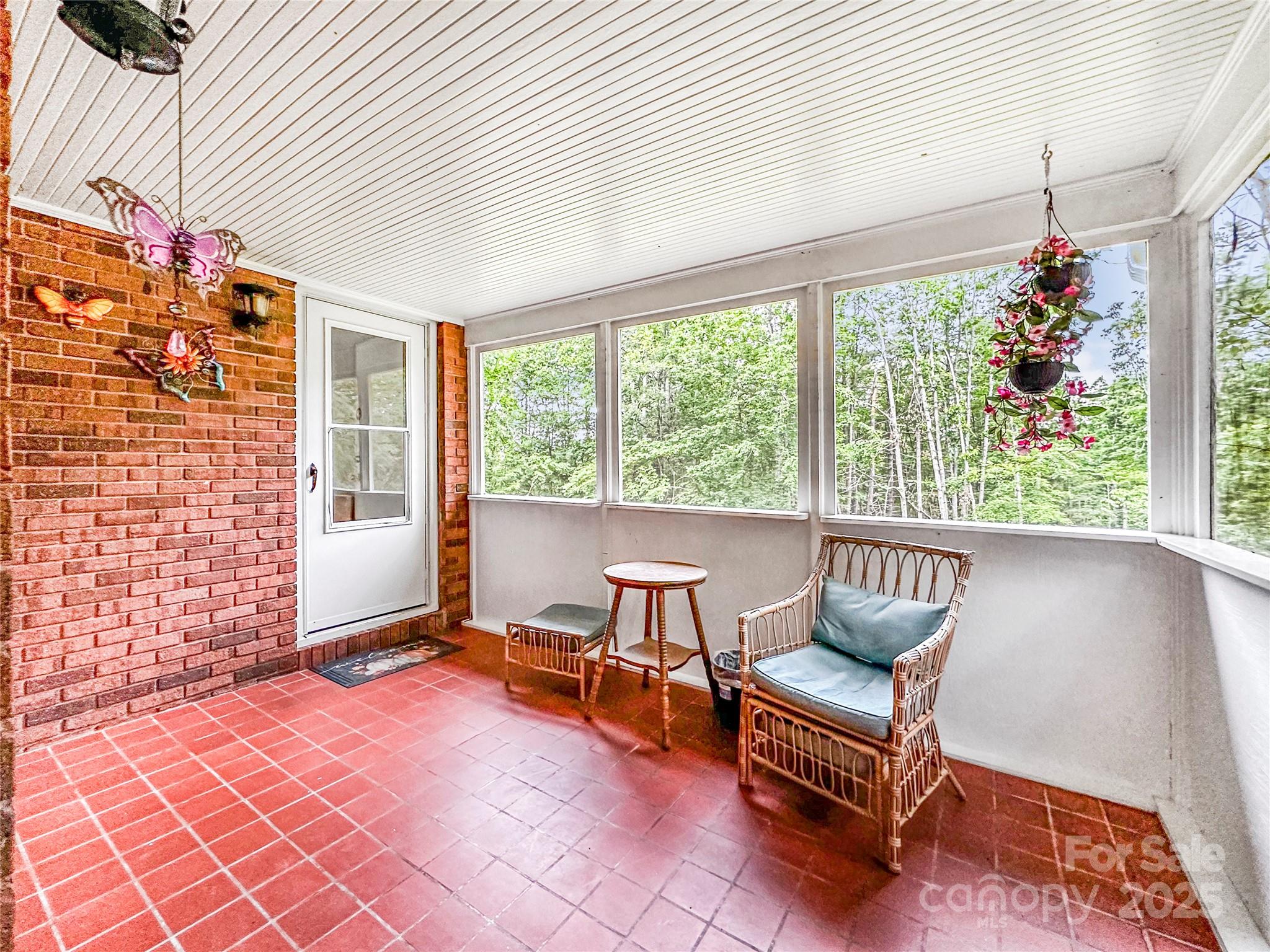 200 Woodside Drive Morganton, NC 28655 - Photo 19 of 48 a living room with furniture and a window