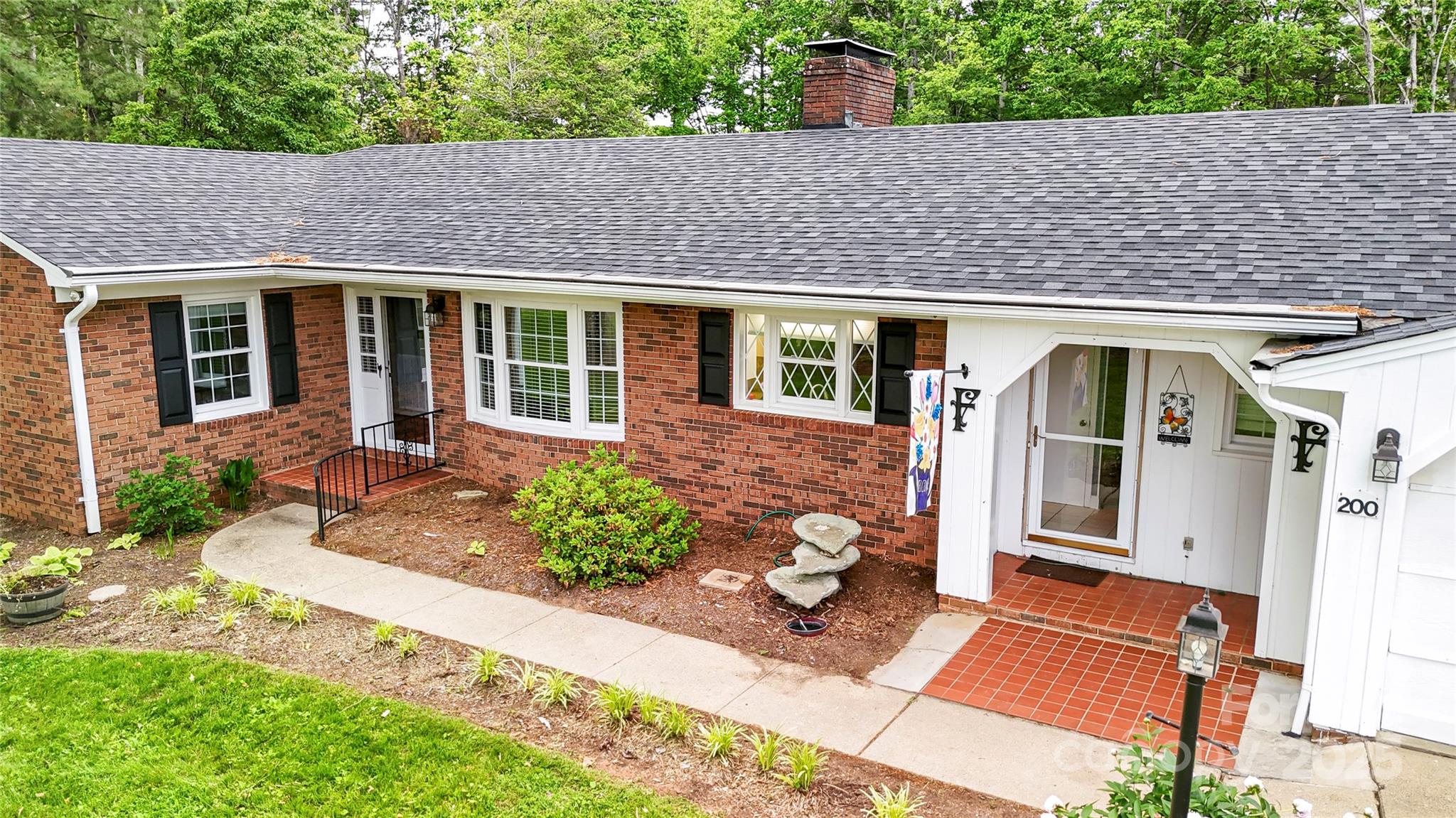 200 Woodside Drive Morganton, NC 28655 - Photo 2 of 48 front view of a house with a yard