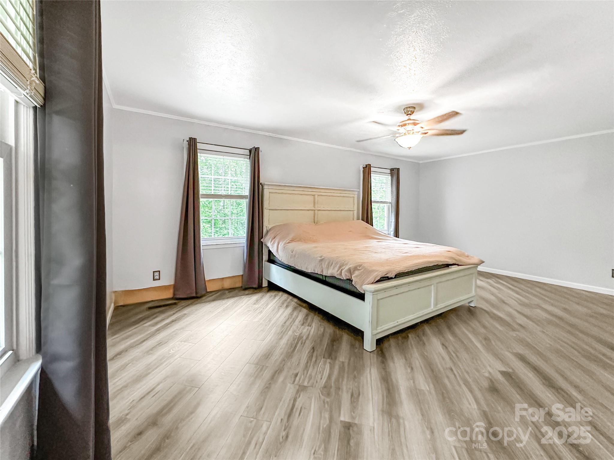 200 Woodside Drive Morganton, NC 28655 - Photo 23 of 48 a bedroom with a bed and a window