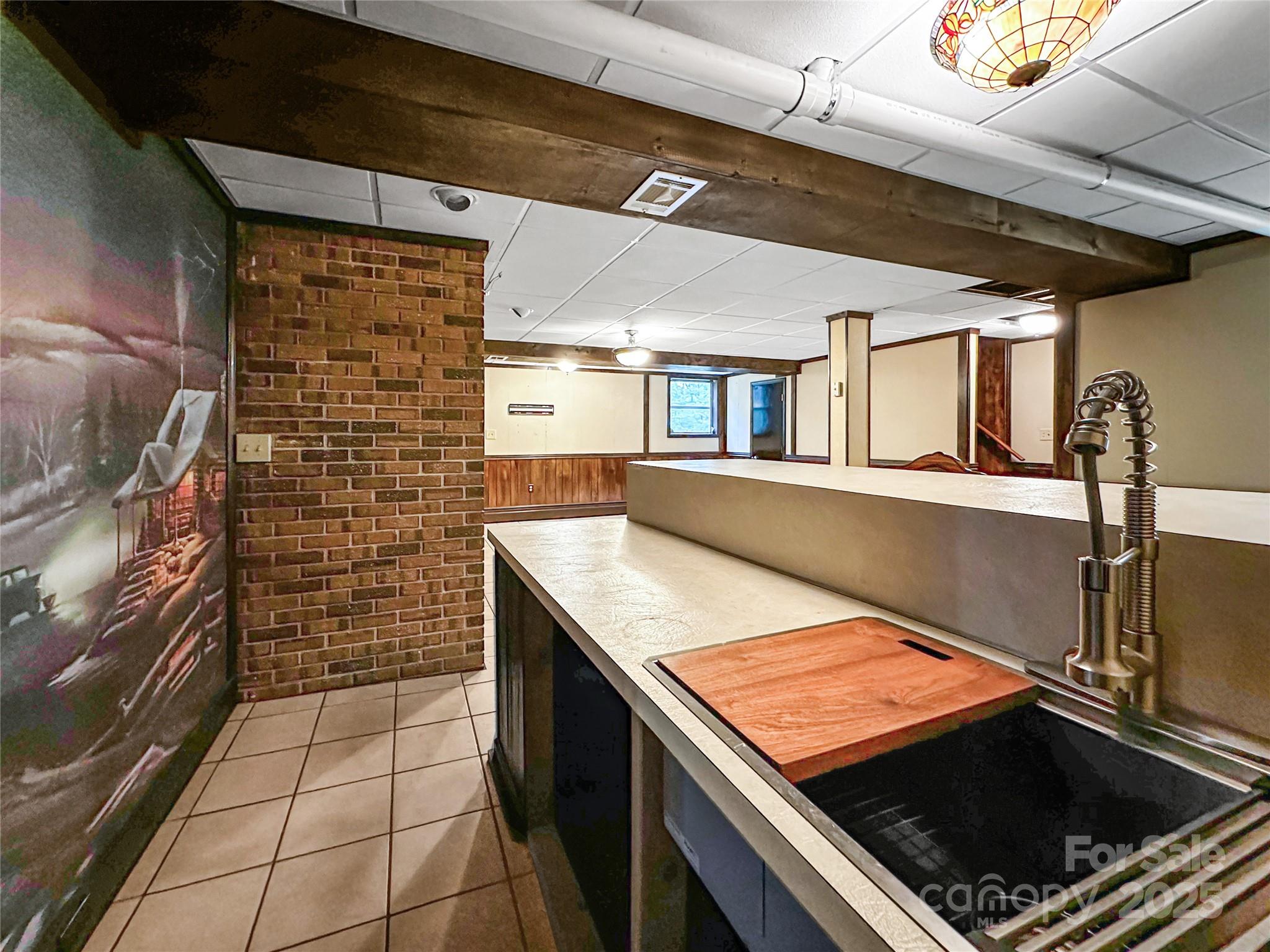 200 Woodside Drive Morganton, NC 28655 - Photo 34 of 48 a kitchen with a sink a stove and cabinets