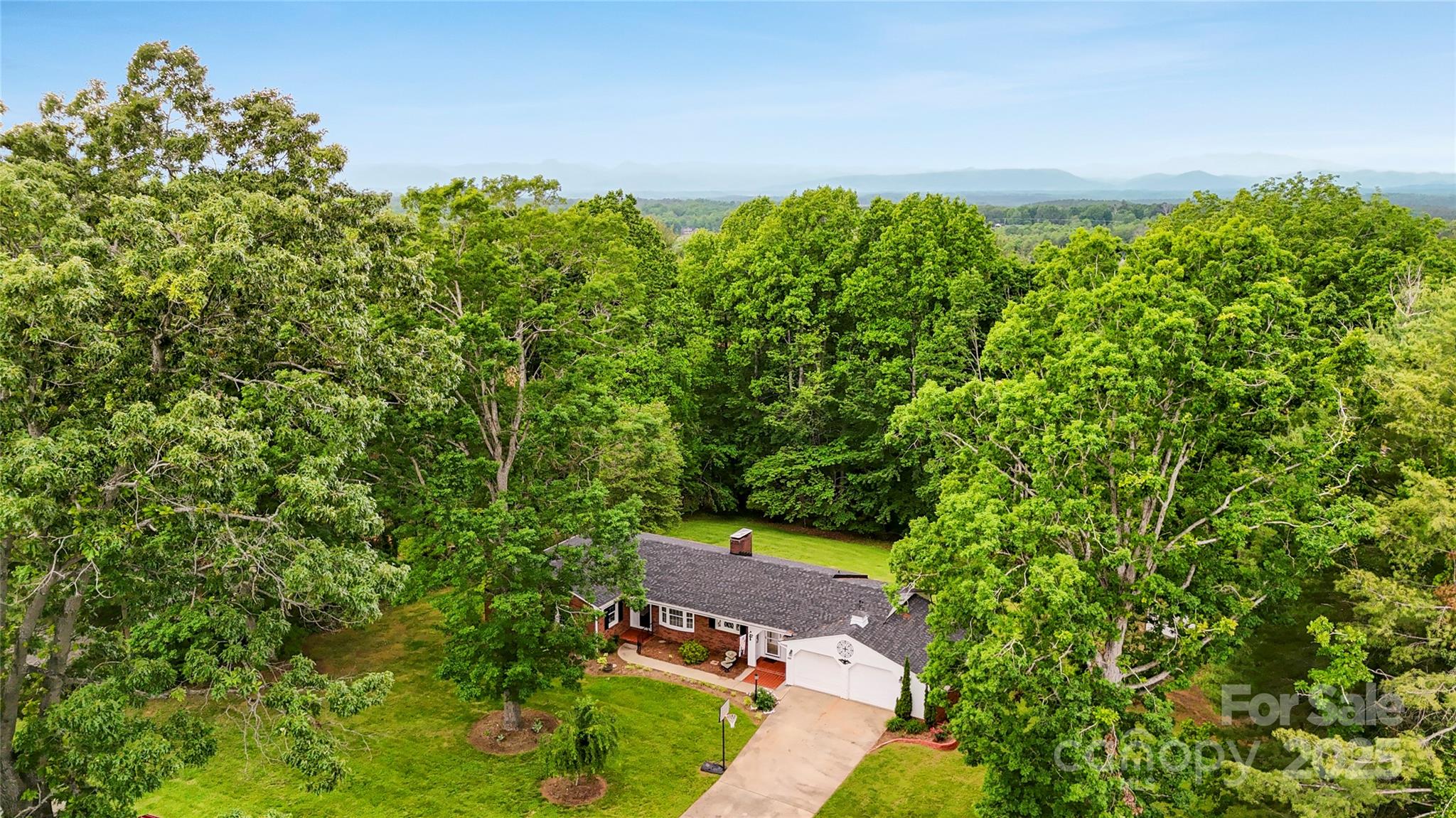 200 Woodside Drive Morganton, NC 28655 - Photo 4 of 48 an aerial view of a house with a yard