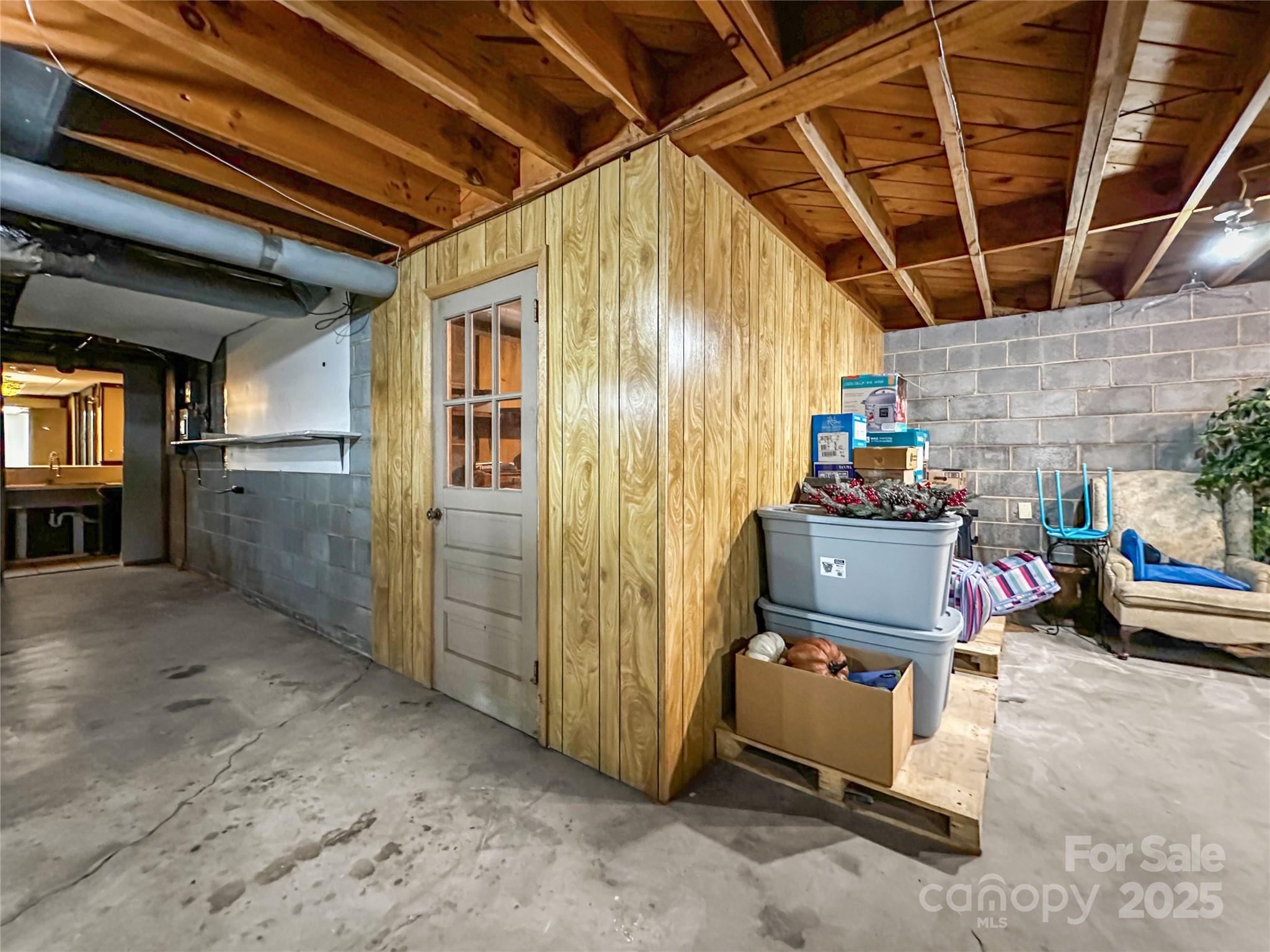 200 Woodside Drive Morganton, NC 28655 - Photo 41 of 48 a view of a storage room with utility room