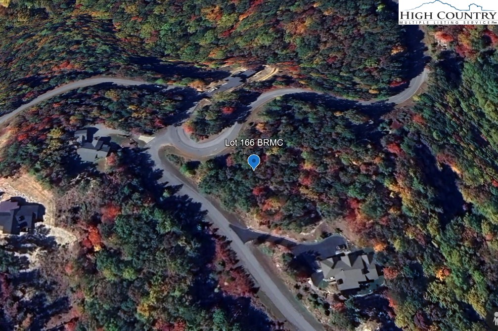 Reynolds Parkway Boone, NC 28607 - Photo 2 of 2 an aerial view of residential house with outdoor space and trees all around