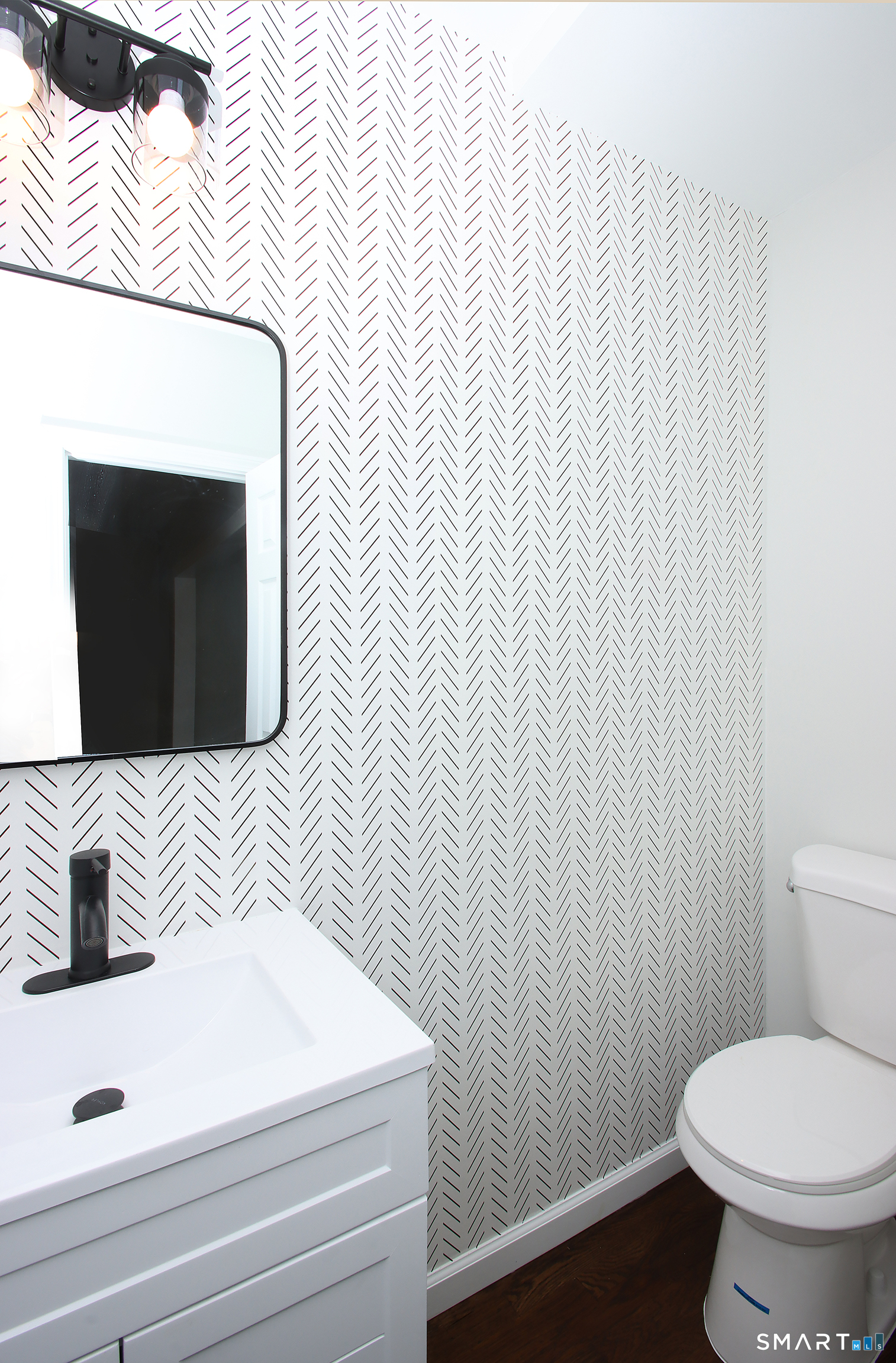 217 Ledgeside Avenue Waterbury, CT 06708 - Photo 15 of 24 a bathroom with a toilet and a sink