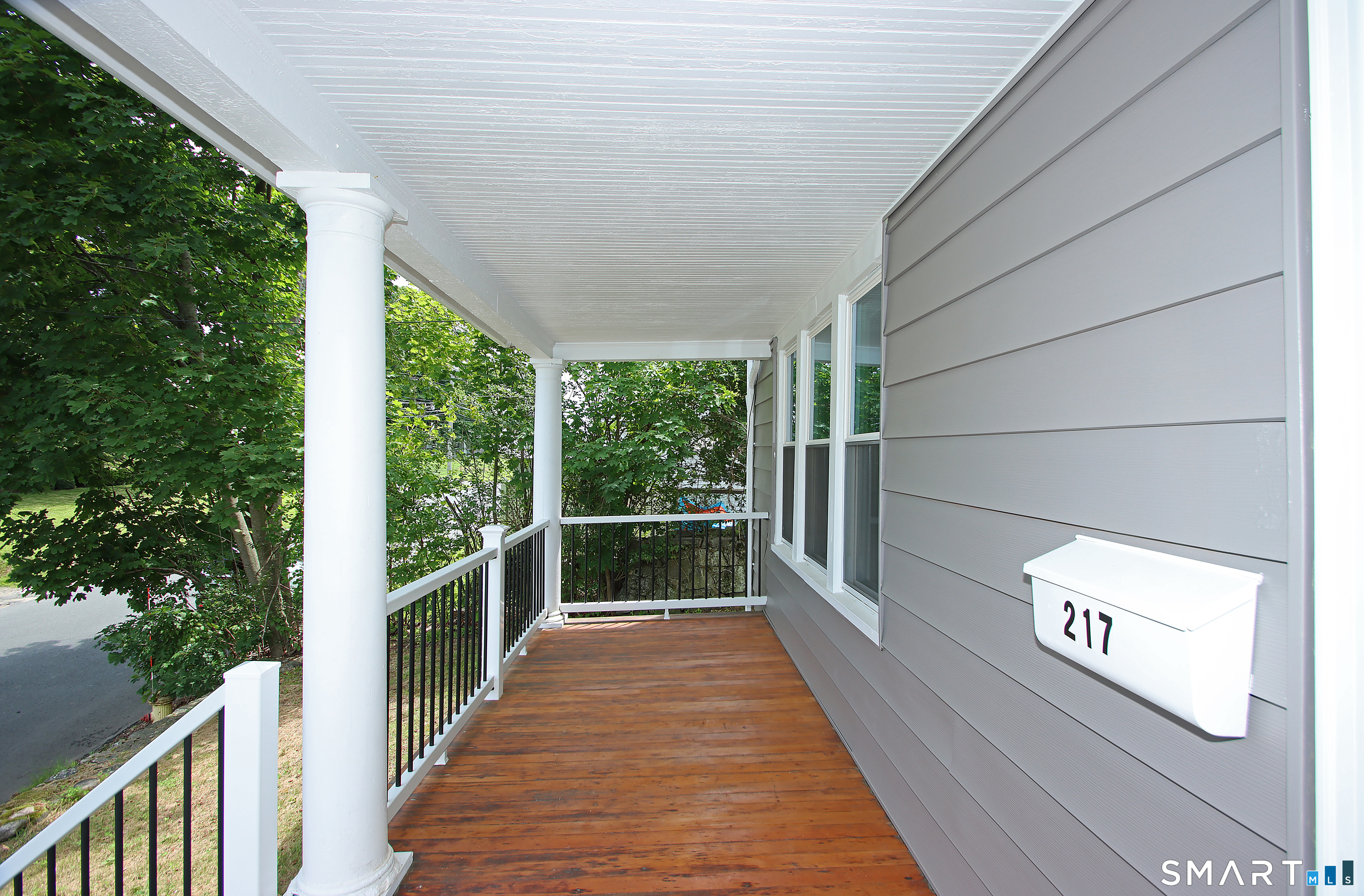 217 Ledgeside Avenue Waterbury, CT 06708 - Photo 2 of 24 a view of a street with balcony