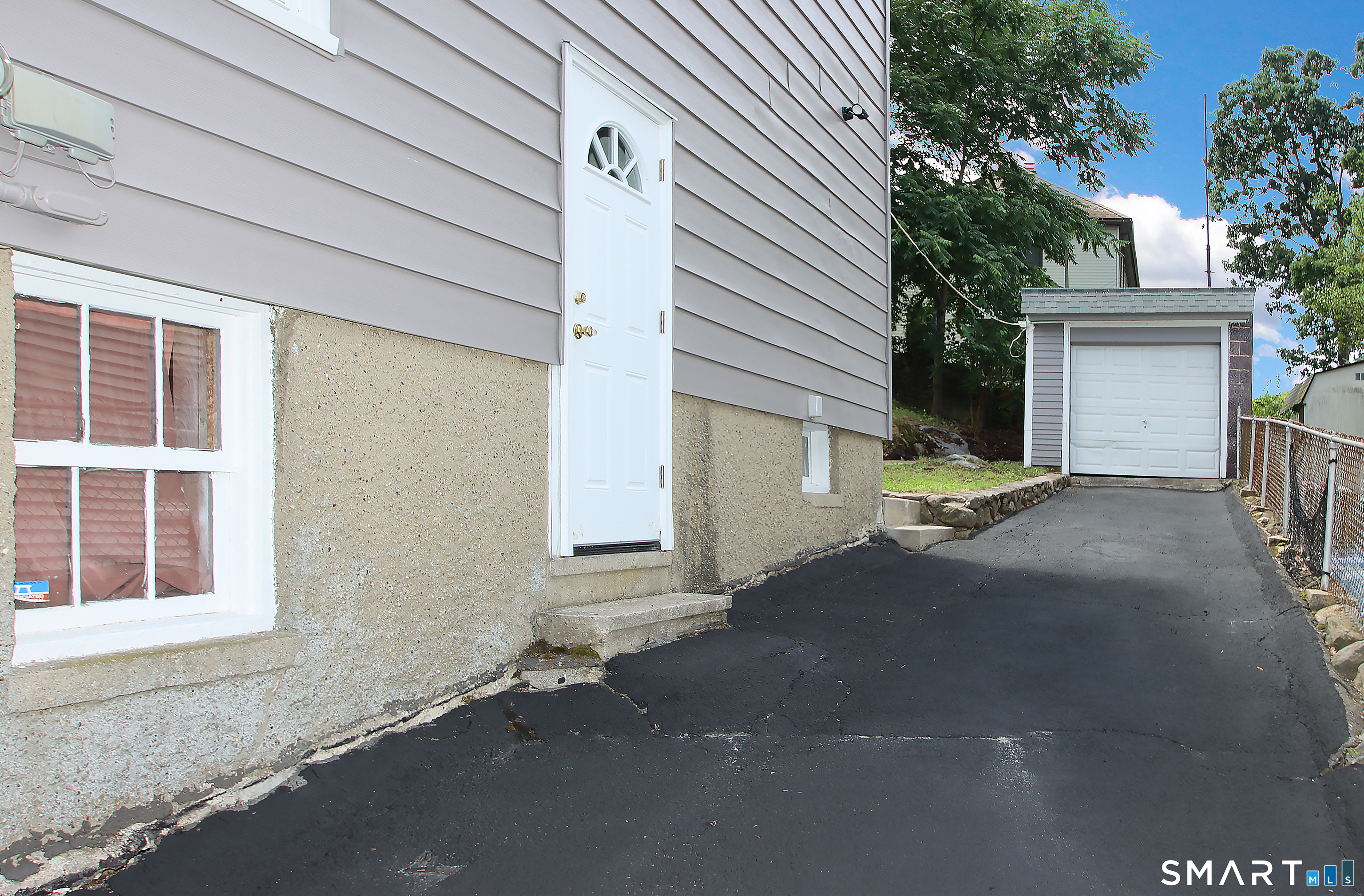 217 Ledgeside Avenue Waterbury, CT 06708 - Photo 24 of 24 a view of a house with a street