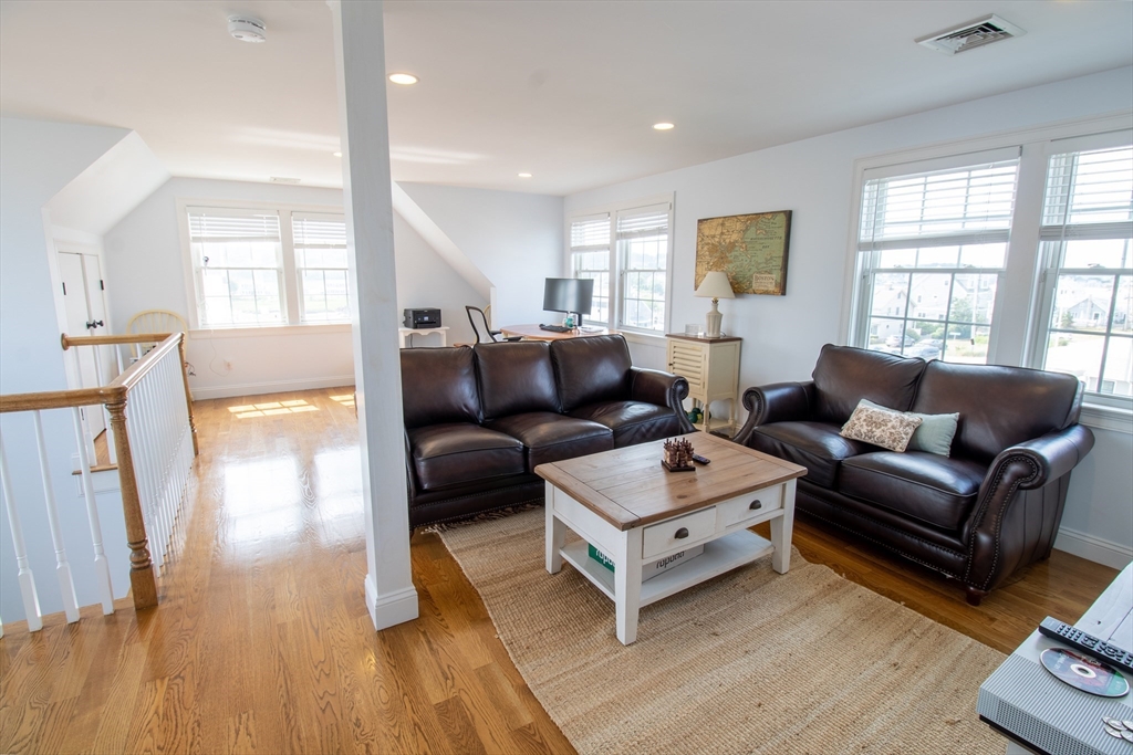 117 River Street Scituate, MA 02050 - Photo 18 of 23 a living room with furniture and a large window