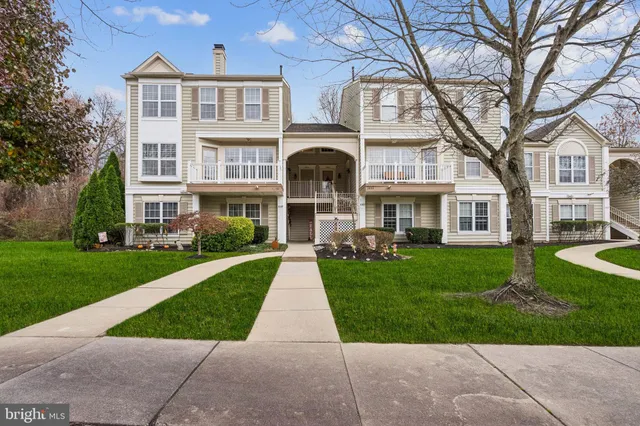 front view of a house and a yard