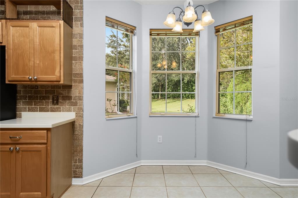 8231 Southwest 79th Court Ocala, FL 34476 - Photo 21 of 39 an empty room with windows