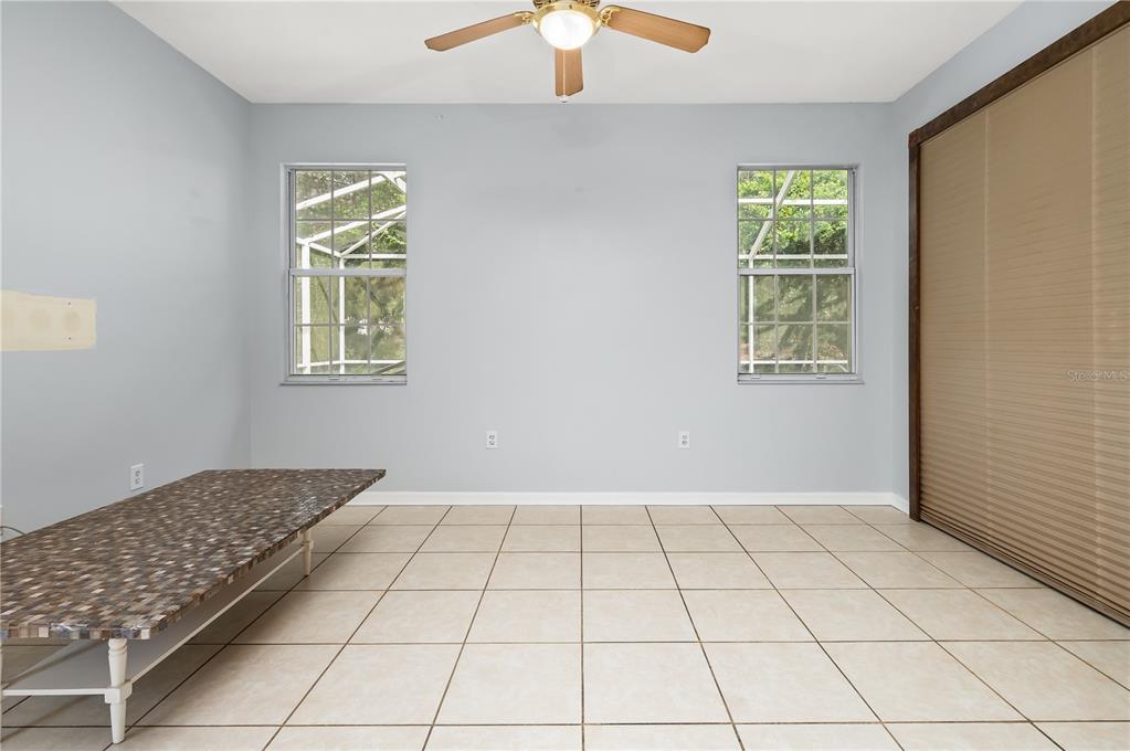 8231 Southwest 79th Court Ocala, FL 34476 - Photo 22 of 39 an empty room with windows