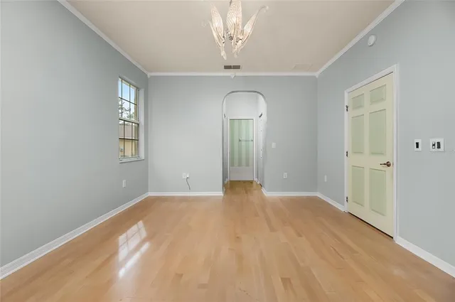 a view of a bathroom from a hallway