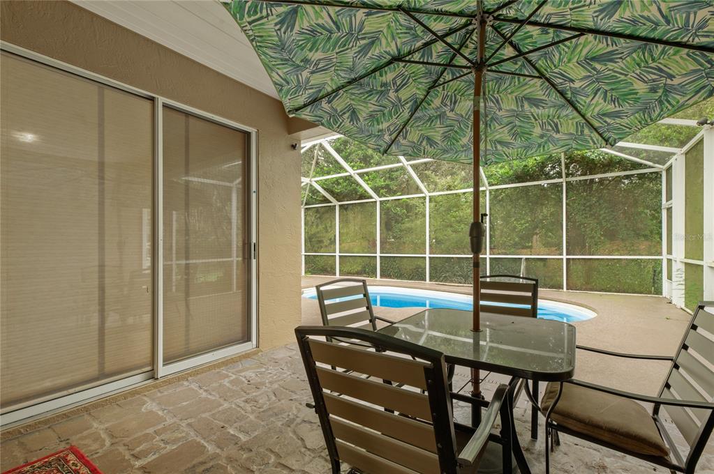 8231 Southwest 79th Court Ocala, FL 34476 - Photo 3 of 39 a dining room with furniture and a window