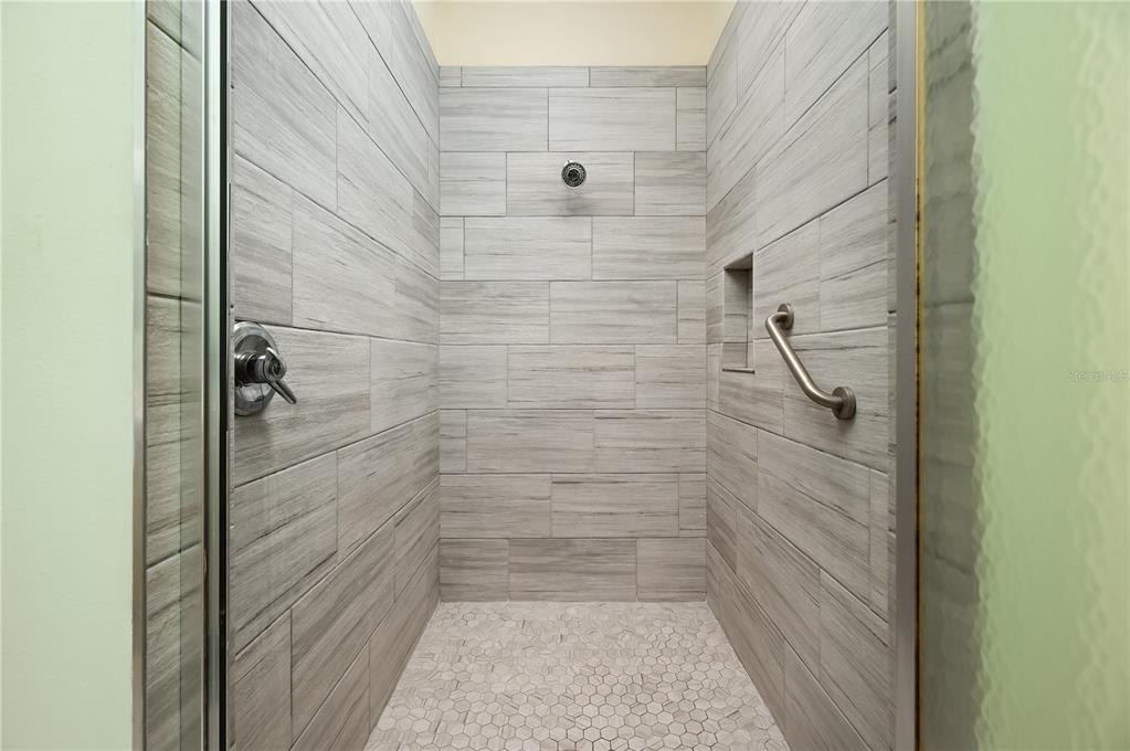 8231 Southwest 79th Court Ocala, FL 34476 - Photo 31 of 39 a bathroom with a shower