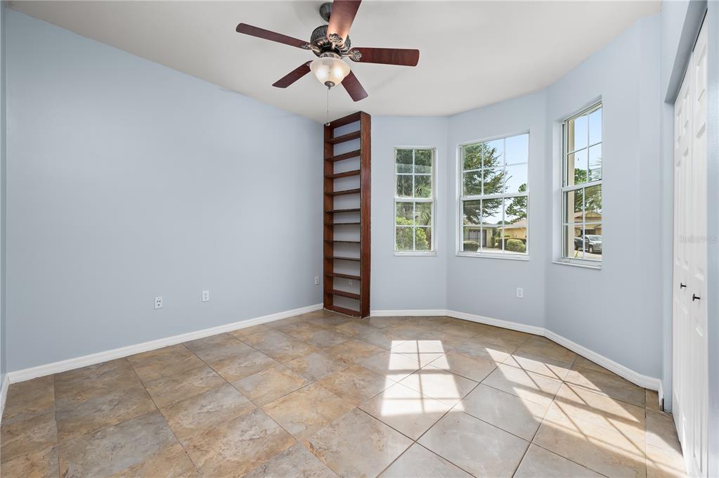 8231 Southwest 79th Court Ocala, FL 34476 - Photo 32 of 39 a view of an empty room with a window