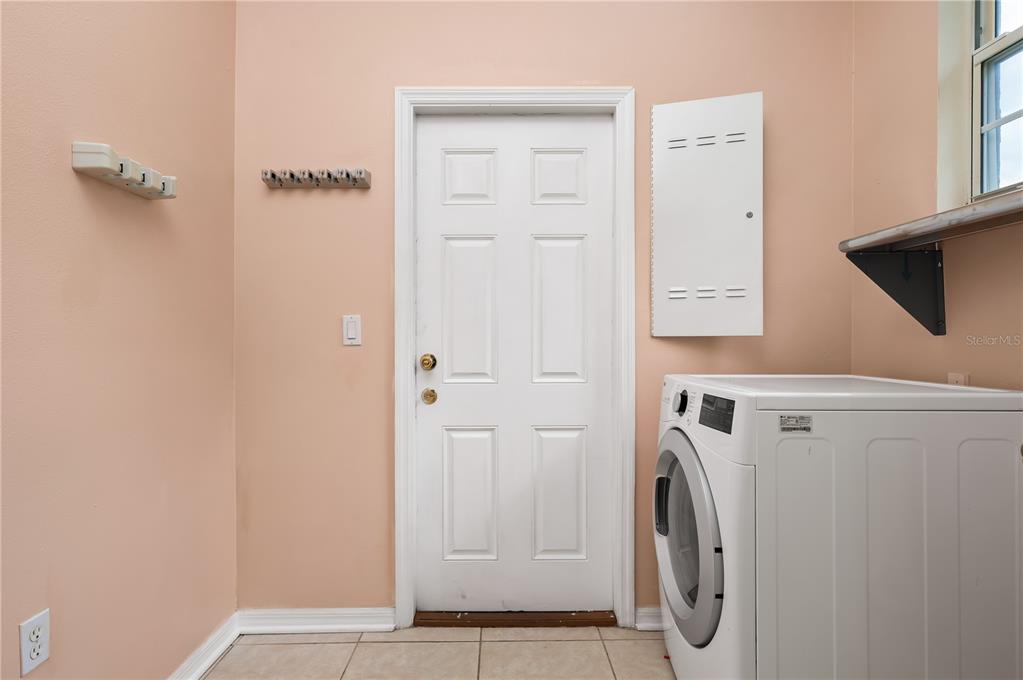 8231 Southwest 79th Court Ocala, FL 34476 - Photo 39 of 39 a utility room with dryer and washer