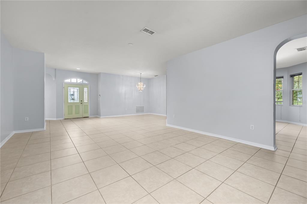 8231 Southwest 79th Court Ocala, FL 34476 - Photo 7 of 39 a view of an empty room and window