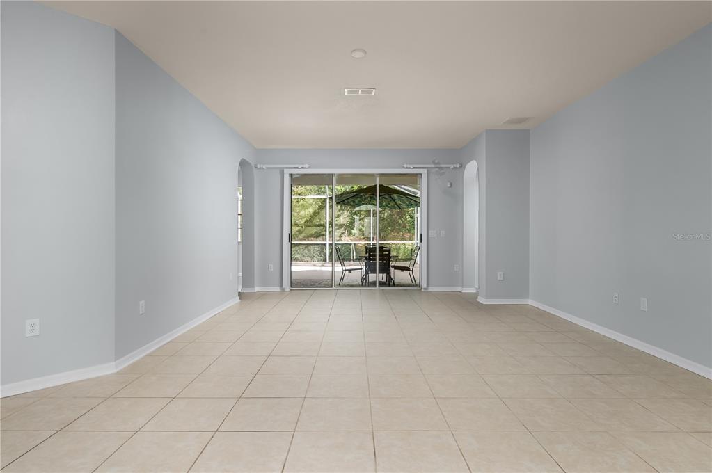 8231 Southwest 79th Court Ocala, FL 34476 - Photo 9 of 39 a view of an empty room with a window