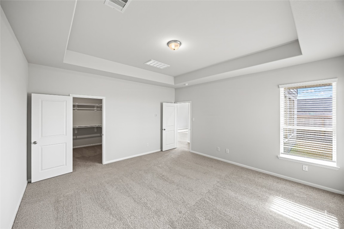 648 Canadian Trail Dayton, TX 77535 - Photo 21 of 37 a view of an empty room with closet and a window