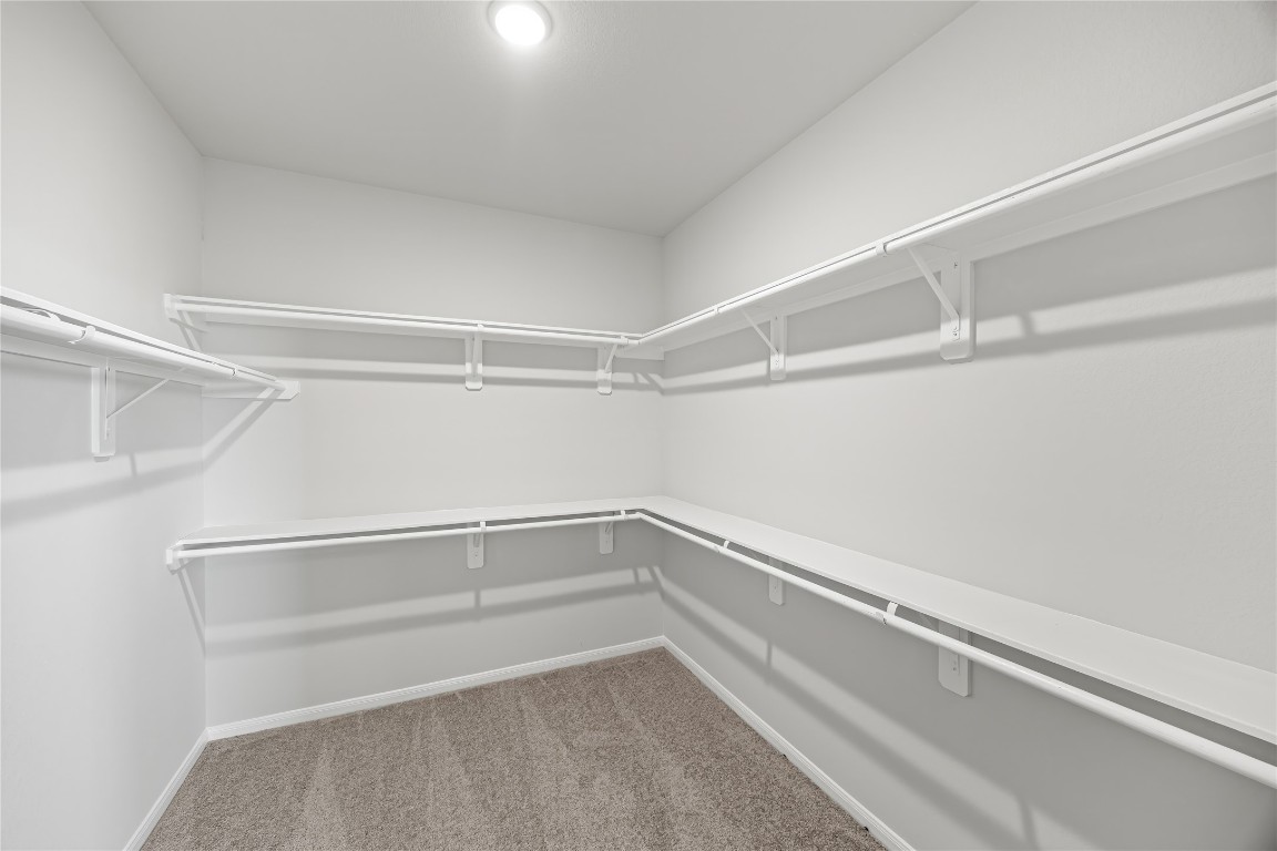 648 Canadian Trail Dayton, TX 77535 - Photo 22 of 37 a view of an empty walk in closet