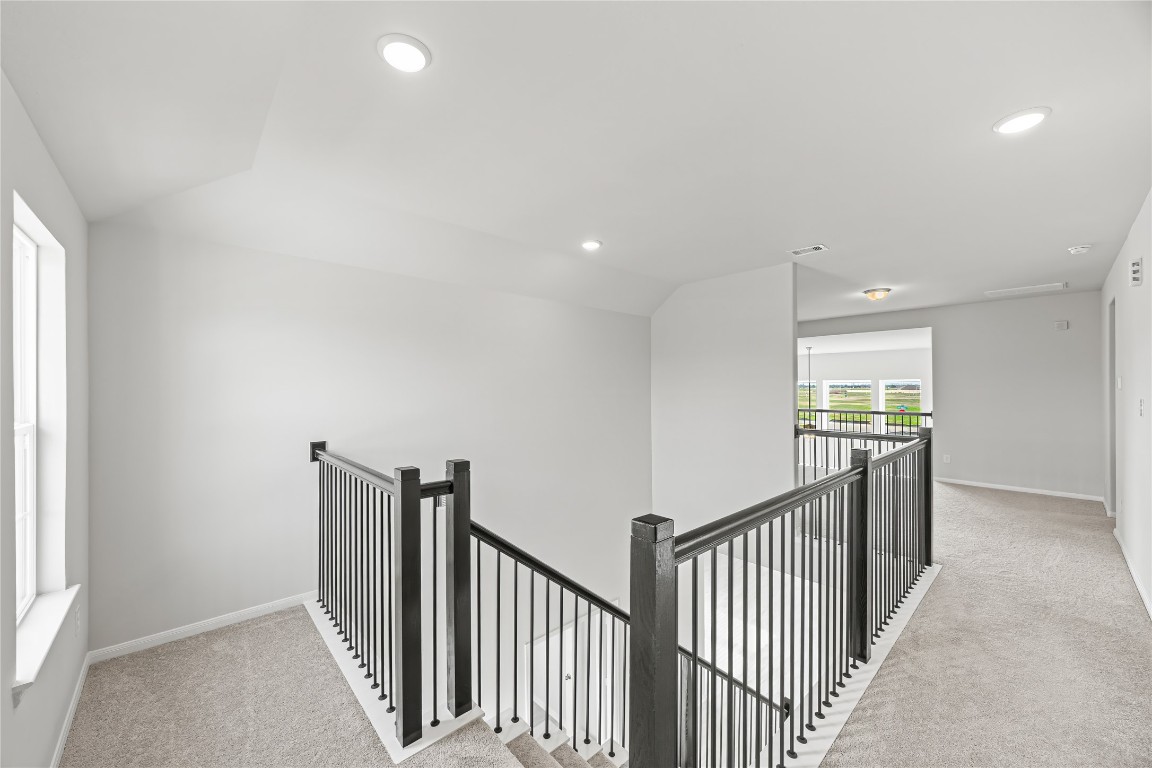 648 Canadian Trail Dayton, TX 77535 - Photo 26 of 37 a view of a hallway with windows