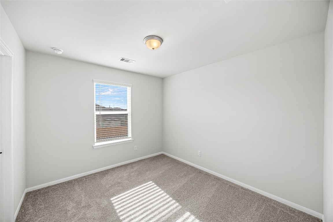 648 Canadian Trail Dayton, TX 77535 - Photo 35 of 37 a view of an empty room with a window