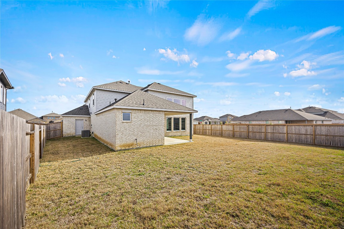 648 Canadian Trail Dayton, TX 77535 - Photo 37 of 37 a house with yard in front of it