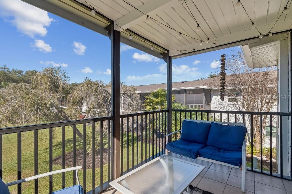 13125 Wilcox Road, Unit 6205 Largo, FL 33774 - Photo 35 of 48 a view of a two chairs in the balcony