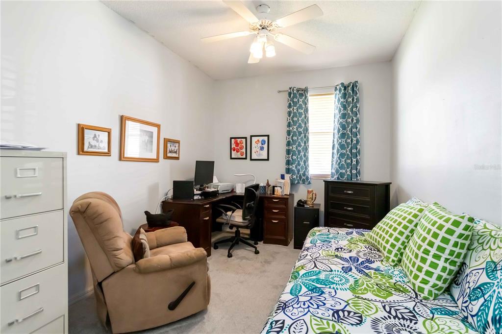 357 Fareham Drive Venice, FL 34293 - Photo 16 of 34 a bedroom with a bed and furniture