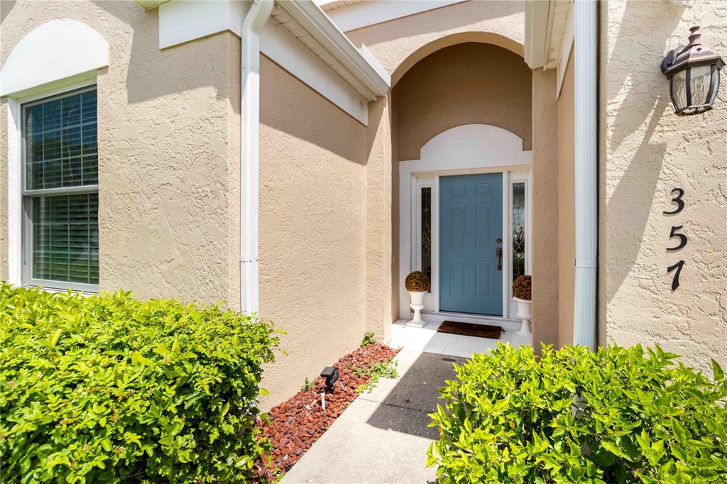 357 Fareham Drive Venice, FL 34293 - Photo 2 of 34 a front view of a house with a yard
