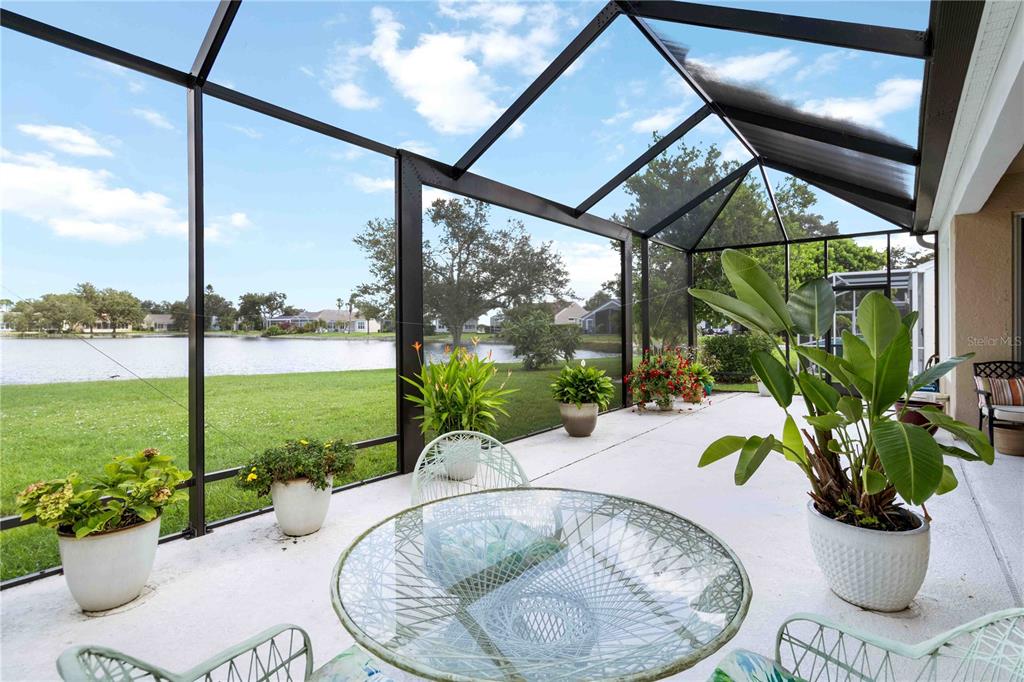357 Fareham Drive Venice, FL 34293 - Photo 26 of 34 a view of a swimming pool with a porch and furniture