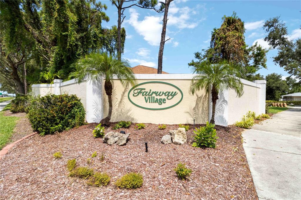 357 Fareham Drive Venice, FL 34293 - Photo 31 of 34 a sign that is on a brick wall