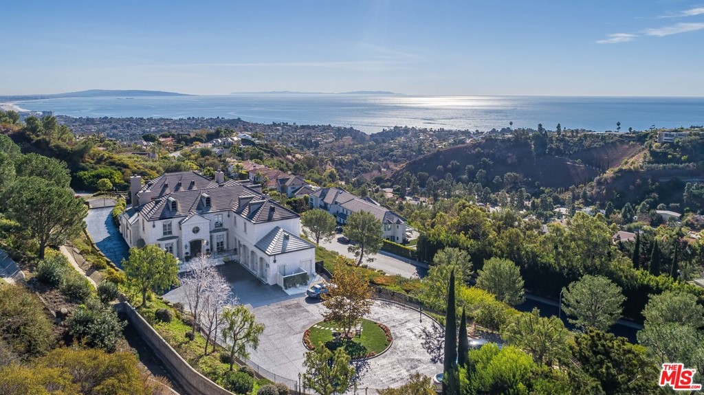 16375 Shadow Mountain Drive Pacific Palisades, CA 90272 - Photo 1 of 50 an aerial view of multiple house